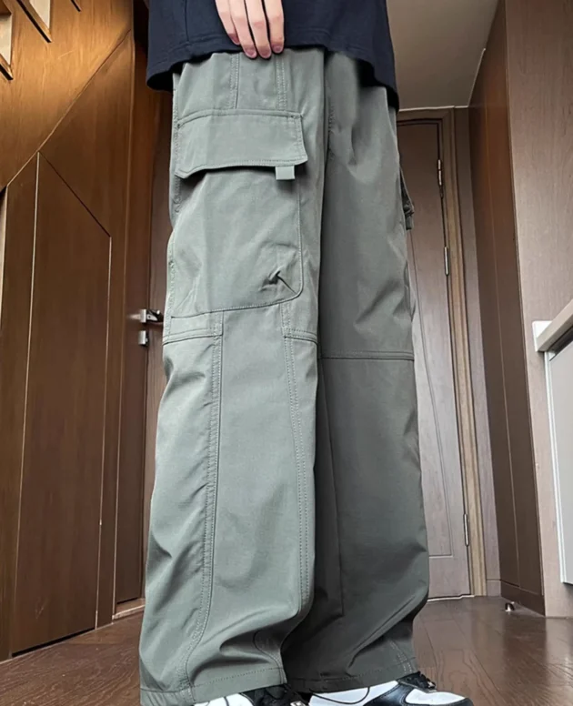 Streetwear Mens Cargo Pants Multi Woven Pocket Foot Rope Hip-Hop Baggy Trousers Solid Drawstring Parachute Pants Men Clothing