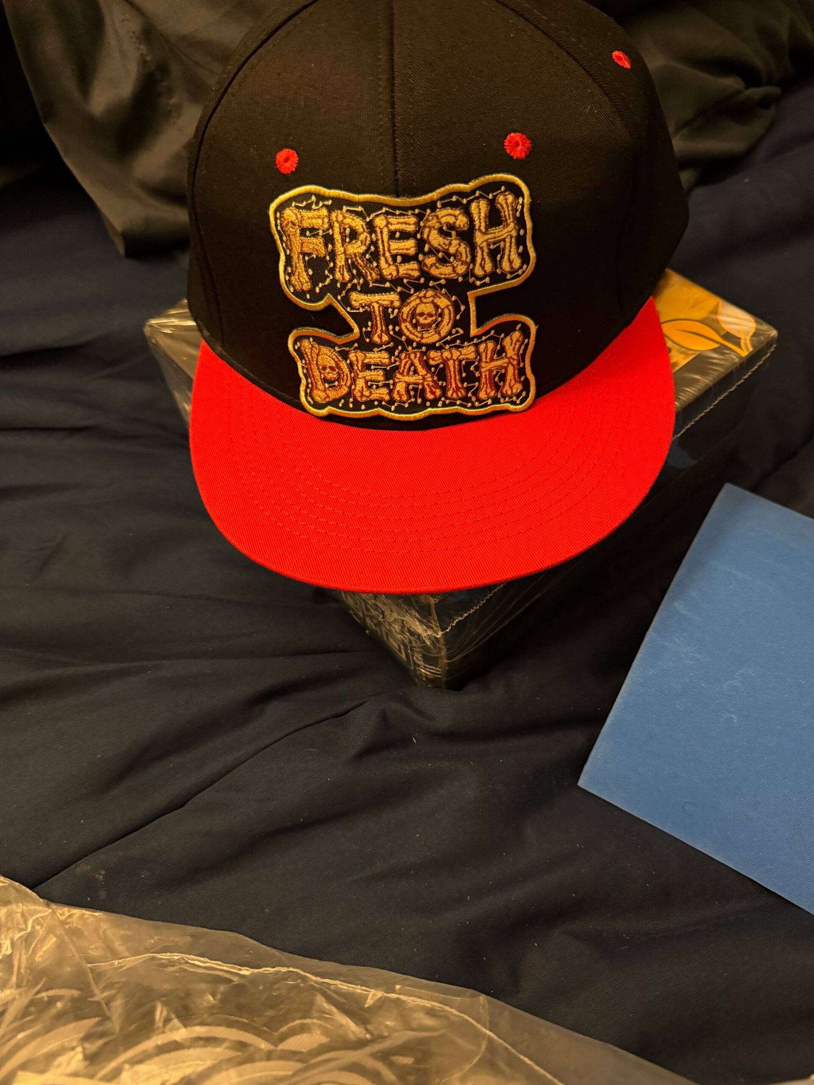 FTD gold patch red brim cap